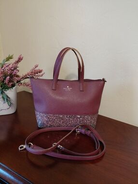 Kate Spade New York Greta Court Ina Glitter Satchel in the color Cherrywood ♠️